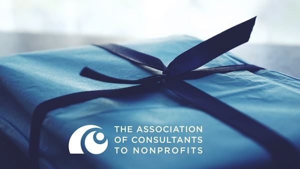 gift wrapped in blue paper with ACN logo